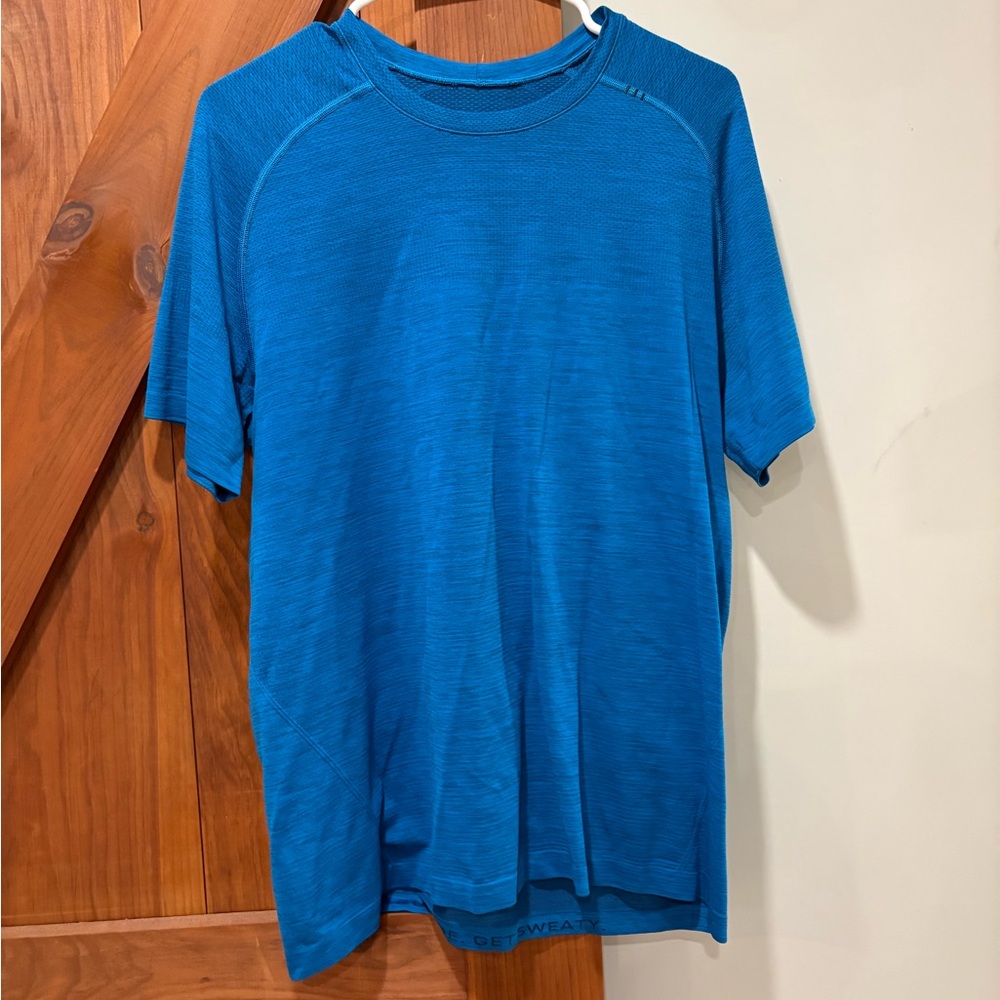 Bright blue metal vent short sleeve shirt